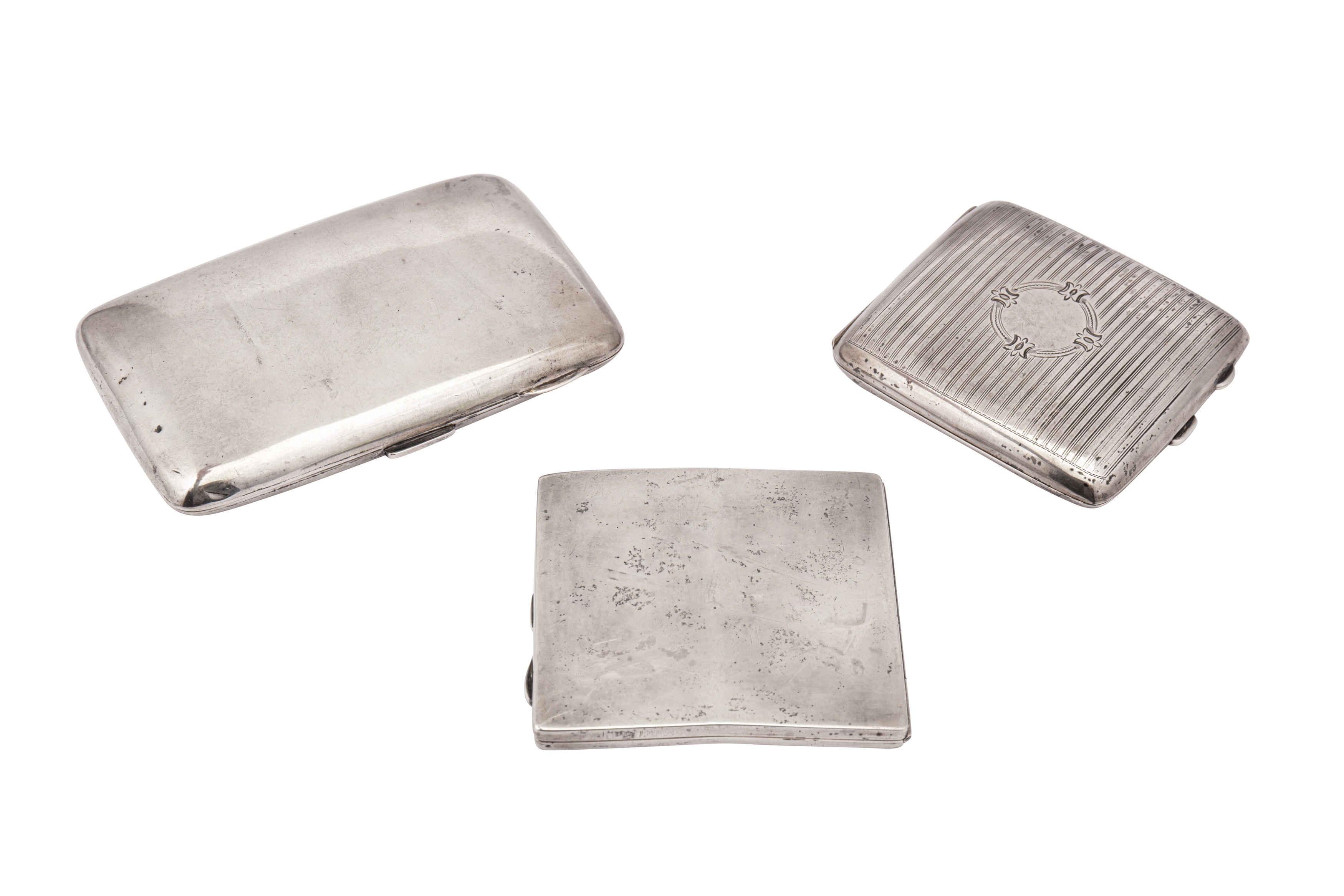 A mixed group of sterling silver cigarette cases