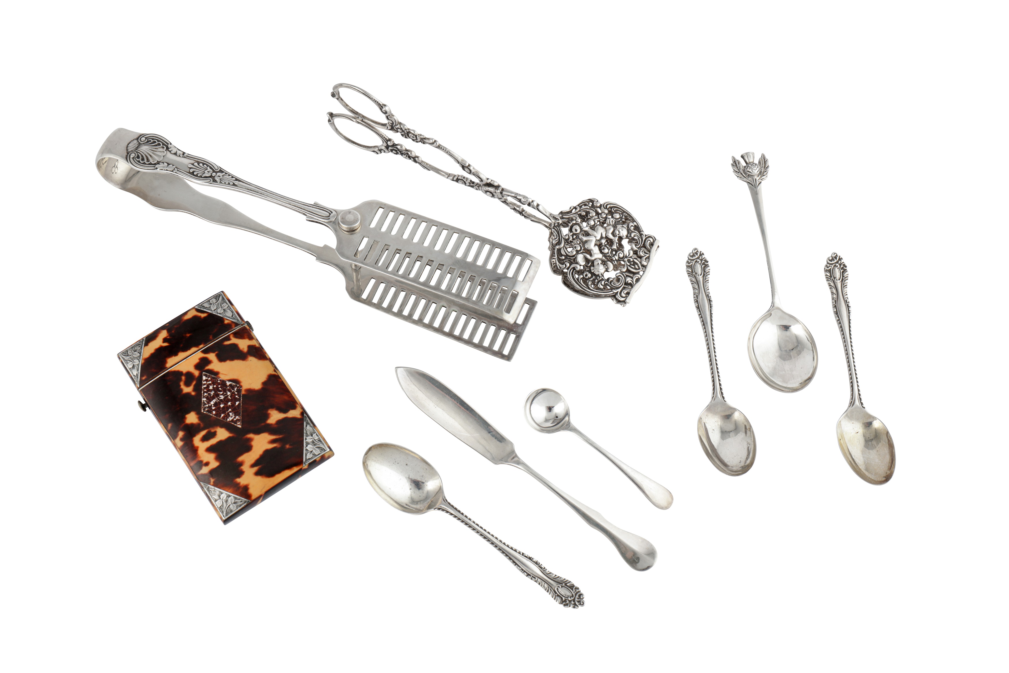 A mixed group, including a Victorian pair of asparagus tongs, Sheffield 1889 by IAM (untraced)