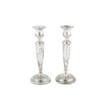 A pair of George VI sterling silver candlesticks, Birmingham 1936/38 by W J Myatt & Co