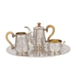 A late 19th century Austrian 800 standard silver bachelor three-piece coffee set on tray, Vienna