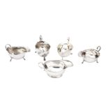 A mixed group of sterling silver sauceboats