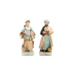 A PAIR OF FRENCH POLYCHROME-PAINTED PORCELAIN FIGURAL SCENT BOTTLES