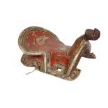 λ A POLYCHROME-PAINTED AND LACQUERED WOODEN SADDLE