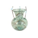 A MAMLUK-REVIVAL ENAMELLED CLEAR GREEN GLASS MOSQUE LAMP