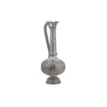A MONUMENTAL ANGLO-INDIAN UNMARKED SILVER WATER EWER (SURAHI)