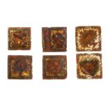 SIX POLYCHROME-PAINTED, GILT AND VARNISHED POTTERY TILES