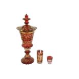 A late19th century Bohemian ruby and gilt glass goblet and cover,