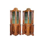 A pair of early to mid 20th Century French rosewood corner display cabinets