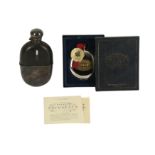 An Edwardian glass and leather mounted hip flask,