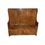 A 19th century rectangular sycamore settle