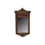 A late 19th Century Continental walnut and parcel gilt pier mirror