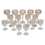 Three sets of Continental clear and gilt drinking glasses