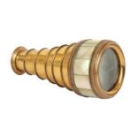 A 19th century French six drawer gilt brass monocular spy glass,