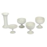 A collection of five 19th century pieces of white opaline glass