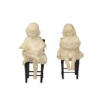 A pair of early 20th century Continental alabaster figures of Children, probably Italian