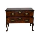 A George II figured walnut chest on stand