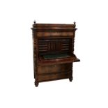 A mid 19th Century flame mahogany secretaire abbtant