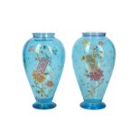 A pair of 19th century French blue glass vases, decorated in the Japonisme style