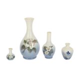 A Copenhagen bottle vase decorated with white blossom,