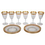 A set of six Continental gilt and clear glass wine goblets, in the manner of Saint-Louis