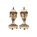 A pair of late 19th century French white marble and gilt bronze cassolettes