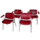 A set of four JSC Castelli chairs, designed by Giancarlo Piretti