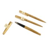 A set of three 18ct gold Parker pens,
