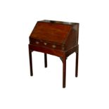 A late 18th century George III mahogany bureau