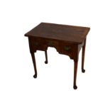 A 18th century figured walnut lowboy