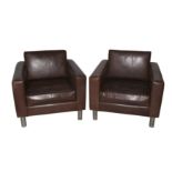 A pair of contemporary Ralph Lauren brown leather tub chairs