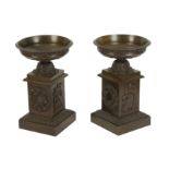 A pair of 19th century patinated bronze tazze,