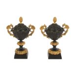 A pair of 19th century bronze and gilt bronze pastile burners,