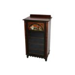 A Victorian Aesthetic Movement walnut and ebonised music cabinet