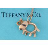 A diamond-set elephant charm necklace, by Tiffany & Co