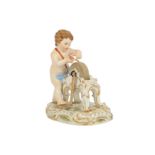 A late 19th century Meissen porcelain figure of Cupid