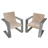 A pair of contemporary cantilever open arm chairs