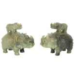 A pair of Chinese green hardstone rhinoceros form incense burners, late 20th century,