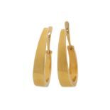 A pair of gold earrings