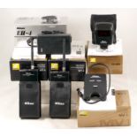 Two Nikon Wireless Transmitters & Other Boxed Accessories.