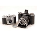 Two Early Olympus Cameras