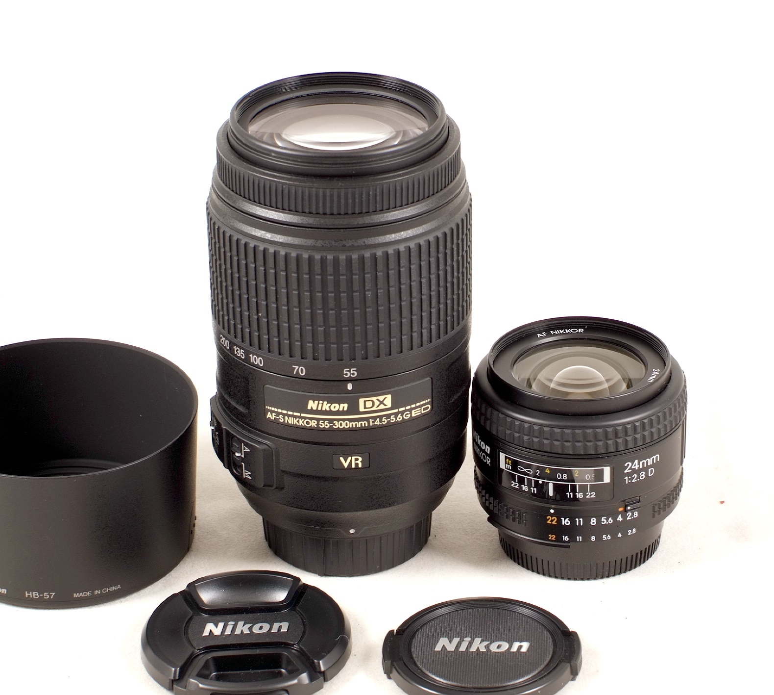 Nikkor 24mm f2.8 & 55-300mm AF-S G Lenses.