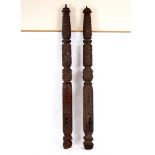 A pair of William IV carved mahogany tester bed posts, boldly carved and of large proportions,