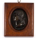 A bronze portrait plaque depicting the emperor Nero, oval, 14cm x 12cm,