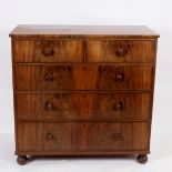 A Victorian mahogany chest, circa 1840, of two short and three long drawers on bun feet,