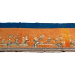A Chinese embroidered altar cloth, 19th Century, depicting boys playing in a garden, on damask silk,