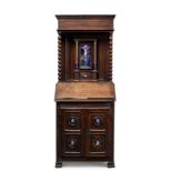 An 18th Century and later walnut and oak prie dieu,