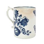 A Lowestoft cylindrical mug, circa 1770, printed in blue with moths and flower sprays, 11.