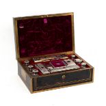 A George IV coromandel and brass mounted dressing case by D Edwards, 21 King St, Bloomsbury, London,