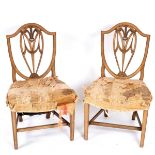 A pair of George III mahogany side chairs,