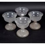 Four Victorian glass honeycomb decorated footed bowls,